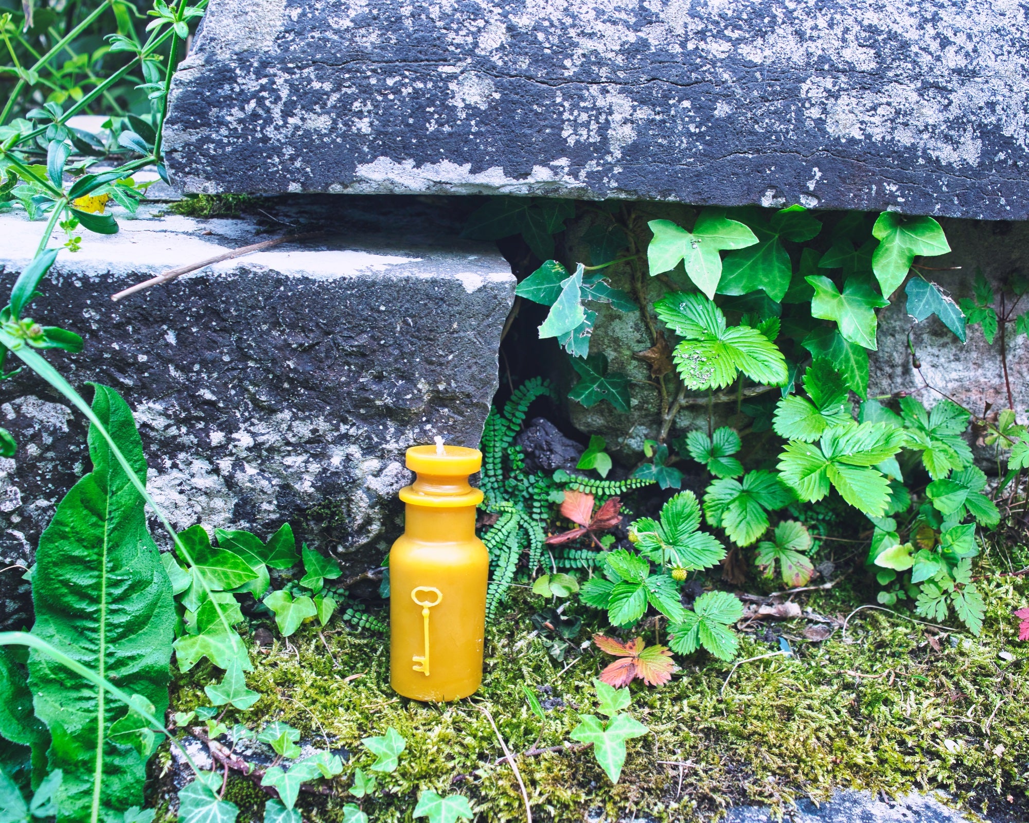 Small Round Potion Bottle with Tiny Skeleton Key